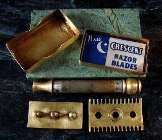 long the brass cylinder razor case has vent holes on each end 