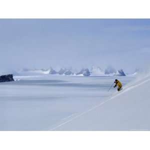  An Expedition Skier Enjoys a Deep Powder Descent of Mount 