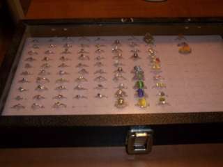 76 rings with a wooden box display case various sizes  