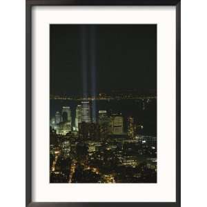  An elevated view of Manhattan Island at night Framed Art 