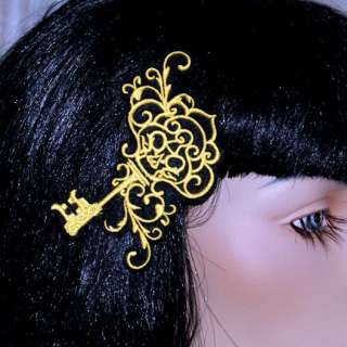 This hair clip is a big bright Skeleton Key. Its embroidered with 