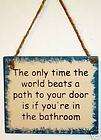 Bathroom Sign~World Beats a path to Your Door