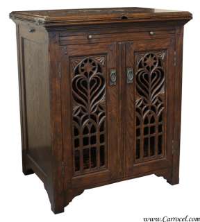 Oak Wine Cabinet with Hand Carved Gothic Motif  