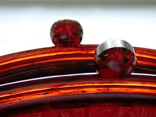 This auction is for a Beautiful Vintage Amber Bakelite Plastic Red 