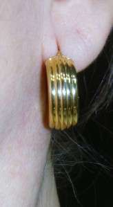 These beautiful earrings are 18K gold marked in the post 750 ITALY 