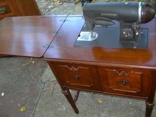   1942 Kenmore Imperial Rotary Sewing Machine with ornate cabinet  