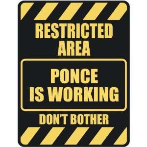   RESTRICTED AREA PONCE IS WORKING  PARKING SIGN