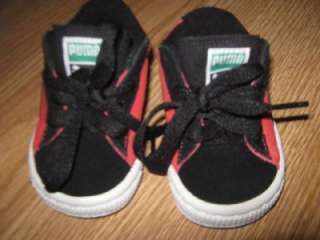 pair of PUMA KINDER FIT BLACK RED SUEDE SNEAKERS SZ 3. These sneakers 