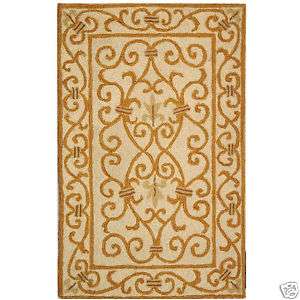 Hand hooked Ivory/Gold Iron Gate Wool Rug 2 x 3  