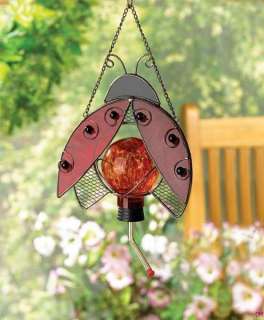 Artistic stained glass ornament does double duty, gracing your garden 