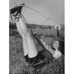  Film Actress Ella Raines Preparing to Use a Bow and Arrow 