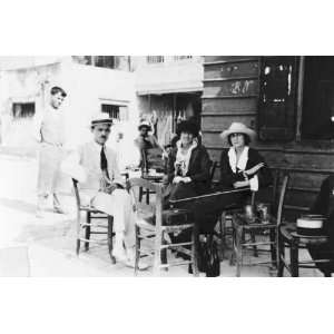1921 Solita Solano, Janet Flanner, and a man seated outdoors, Crete 