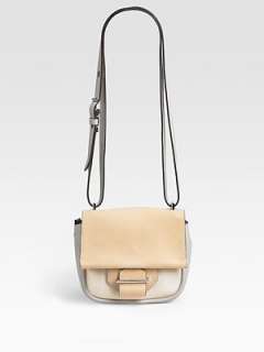 Adjustable crossbody strap, 24 26 drop Snap flap closure One 