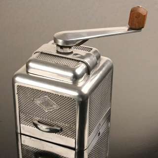 Very rare french art deco machine age designed coffee grinder. A most 