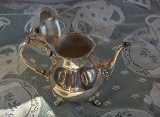   coffee/tea service made by Webster Wilcox IS silver in pattern