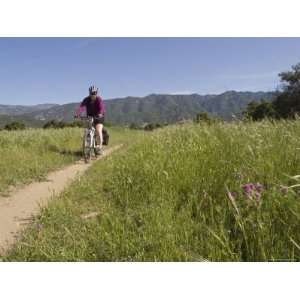Woman Mountain Biking on the Multi Use Trail System in Ojai Stretched 