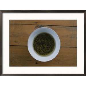  Tea Leaves Steep in a Cup of Hot Water for Green Tea 