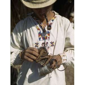  Man Carries His Tobacco in an Iguana Skin Pouch 